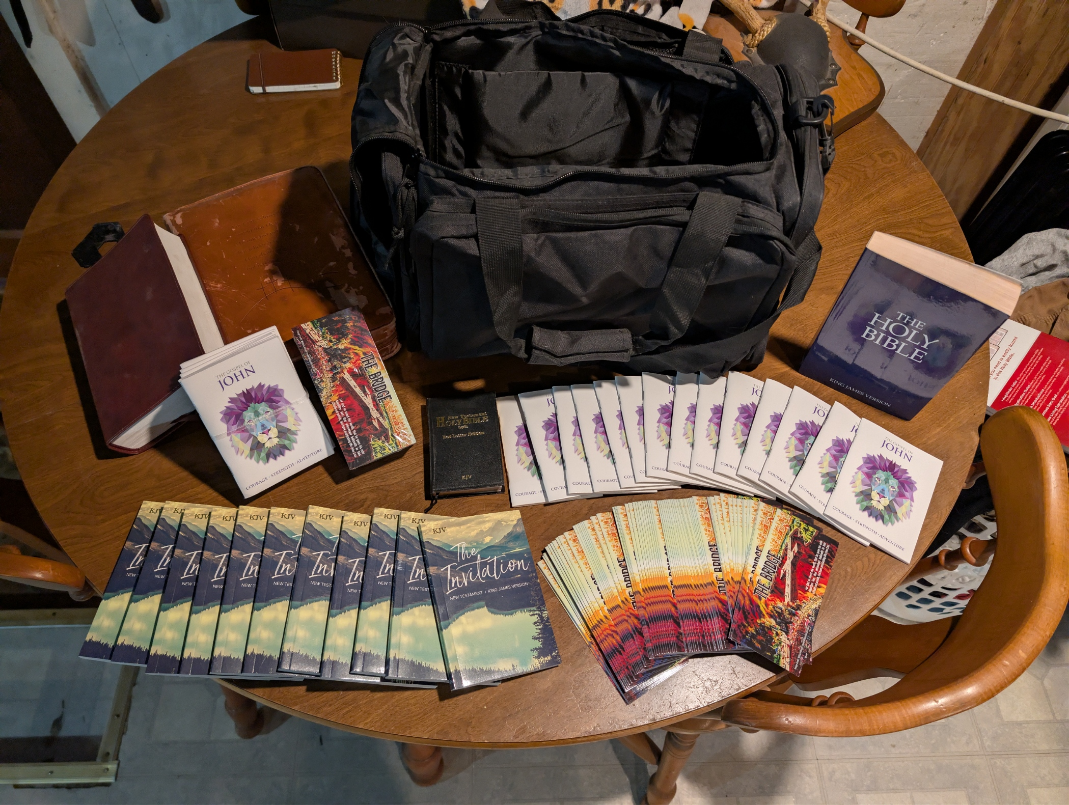 Backpack outreach bag with Bibles, Gospel of John booklets, and gospel tracts